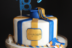 gold and blue graduation cake