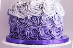Purple and white tiered cake